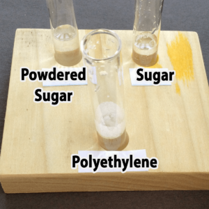 Photo of the results of adding water to powdered sugar, granulated sugar, or polyethylene samples