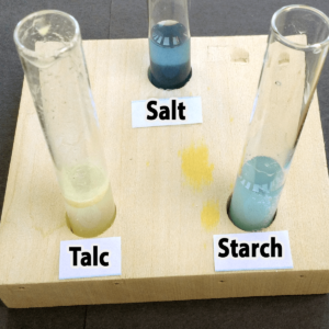 Photo of the results of adding one drop of bromothymol blue to salt, talc, and starch samples