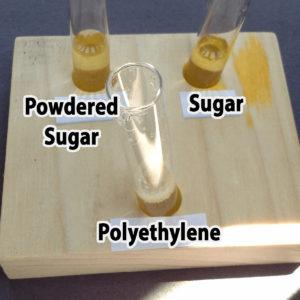Photo of the results of adding one drop of vinegar to powdered sugar, granulated sugar, and polyethylene samples
